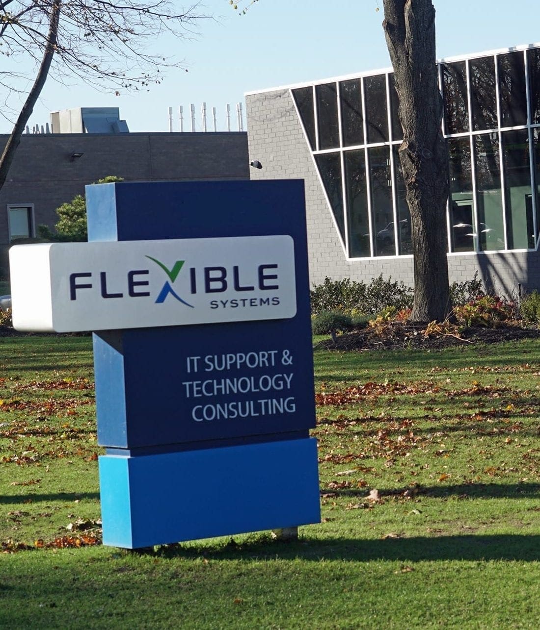 Monument Sign in front of Flexible Systems' Building